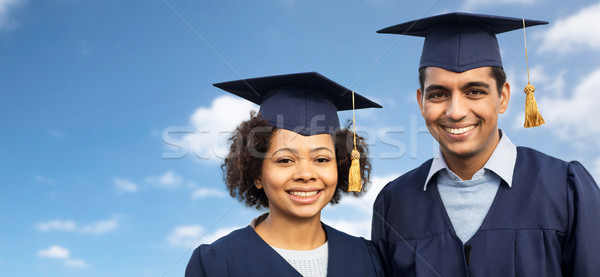 Foto stock: Estudiantes · solteros · cielo · educación · graduación · personas