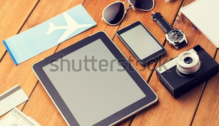 close up of smartphone and travel stuff Stock photo © dolgachov