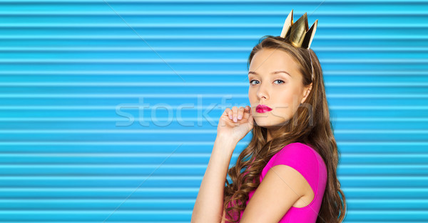 young woman or teen girl in pink dress Stock photo © dolgachov