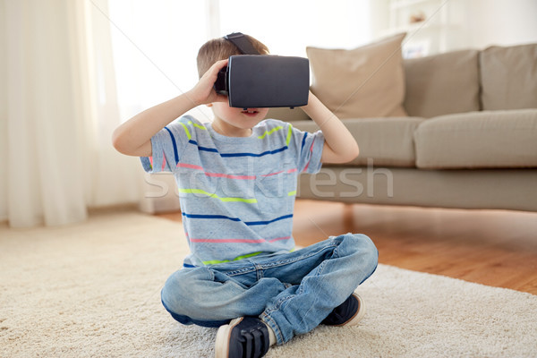 little boy in vr headset or 3d glasses at home Stock photo © dolgachov