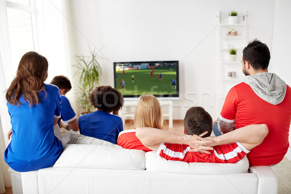 Football fans regarder football jeu tv [[stock_photo]] © dolgachov