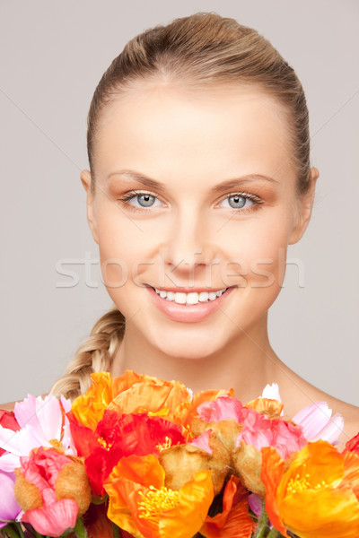 Frau roten Blumen Bild Blumen Gesicht Schönheit Stock foto © dolgachov