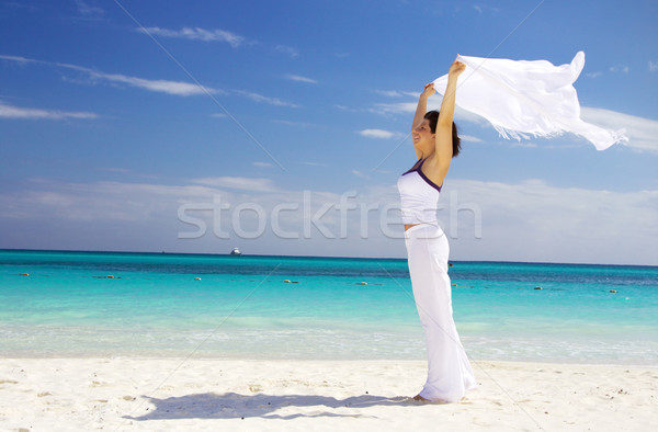 happy woman with white sarong Stock photo © dolgachov