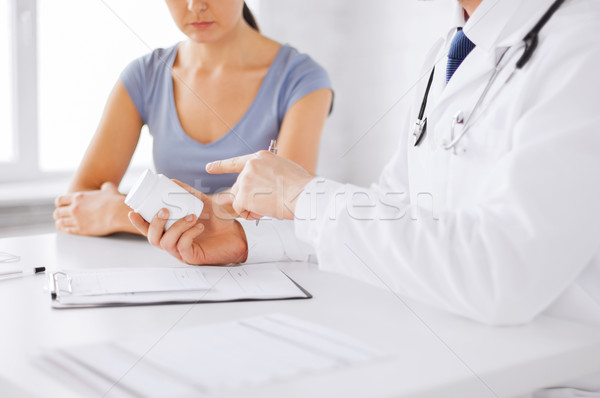 Stock photo: patient and doctor prescribing medication