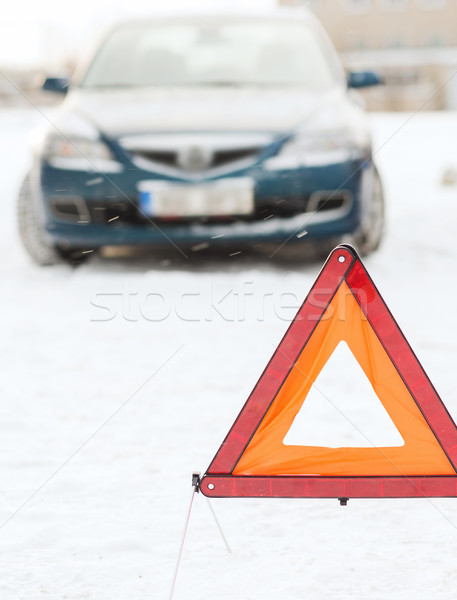 closeup of warning triangle and car Stock photo © dolgachov