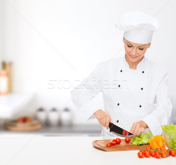 Stockfoto: Glimlachend · vrouwelijke · chef · koken · voedsel