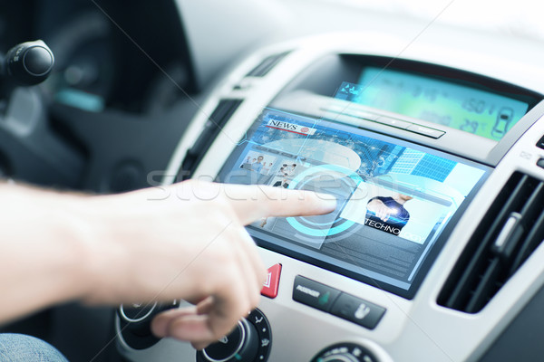 Adam araba kontrol paneli okumak haber taşımacılık Stok fotoğraf © dolgachov