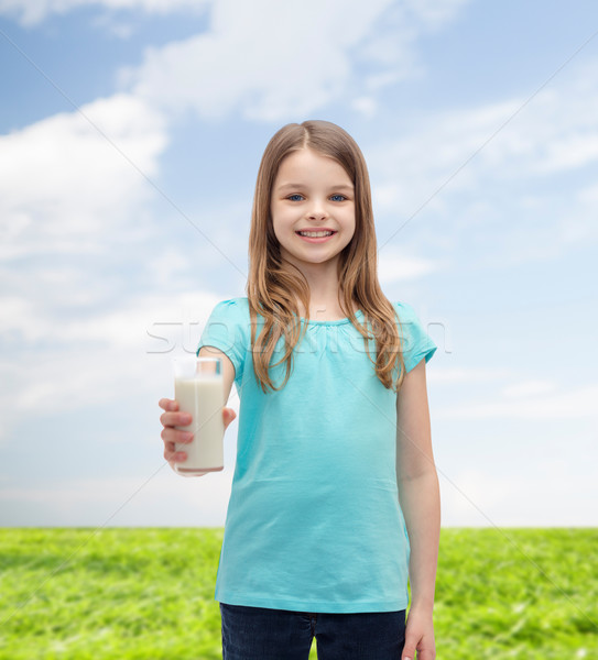 Sorridere bambina vetro latte salute bellezza Foto d'archivio © dolgachov