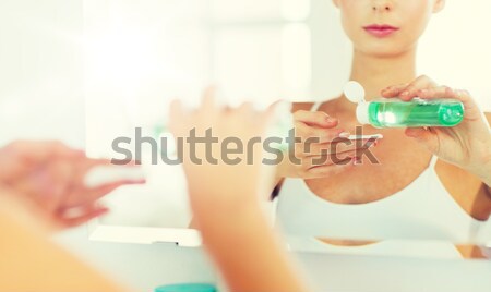 Stock photo: closeup of woman hand with big blue cocktail ring