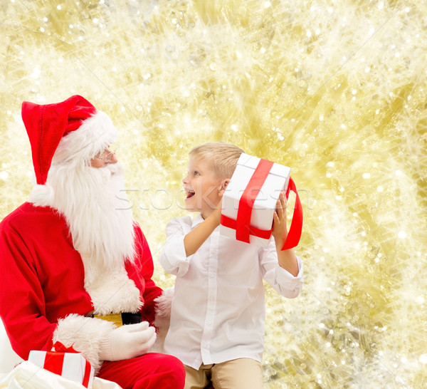 Gülen küçük erkek noel baba hediyeler tatil Stok fotoğraf © dolgachov