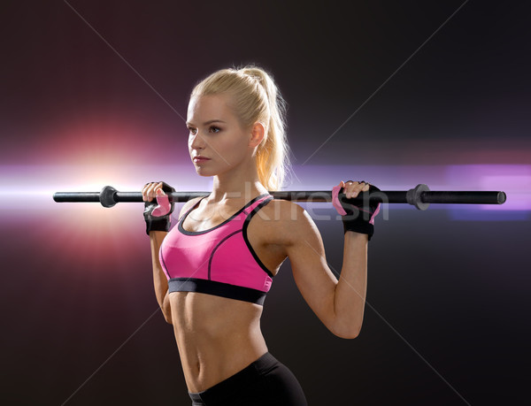 женщину штанга фитнес спорт Сток-фото © dolgachov