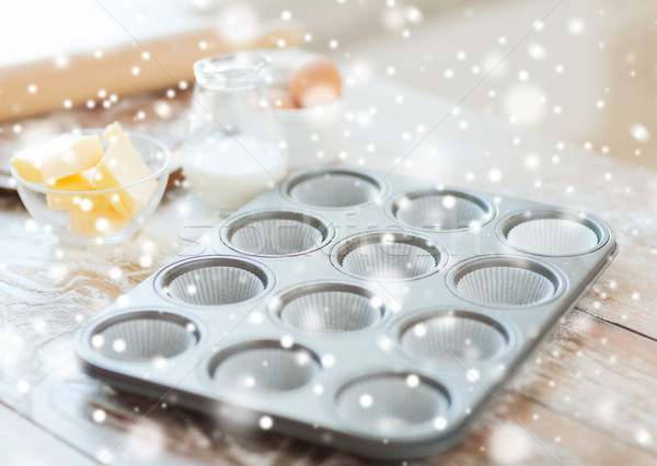 close up of empty muffins molds Stock photo © dolgachov