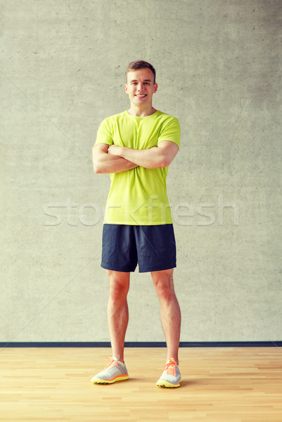 Sorridente homem ginásio esportes fitness estilo de vida Foto stock © dolgachov