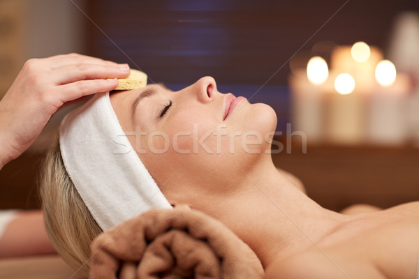 Stock photo: close up of woman having face cleaning in spa