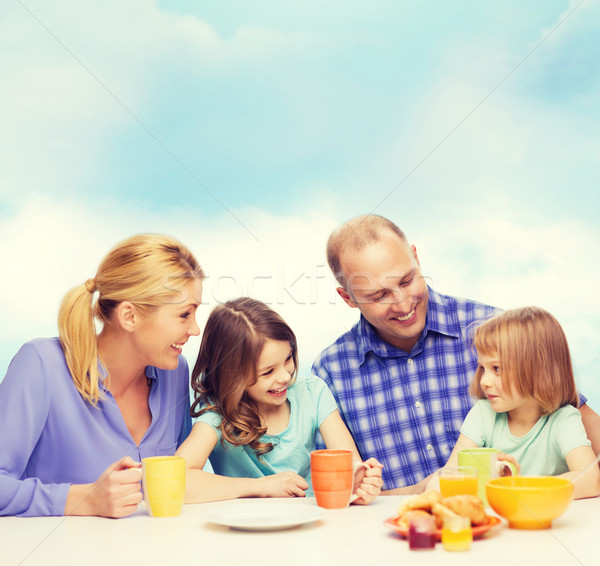 Stock foto: Glückliche · Familie · zwei · Kinder · Frühstück · Essen · Familie