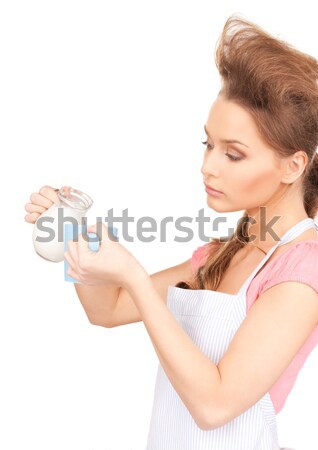 housewife with milk and mug Stock photo © dolgachov