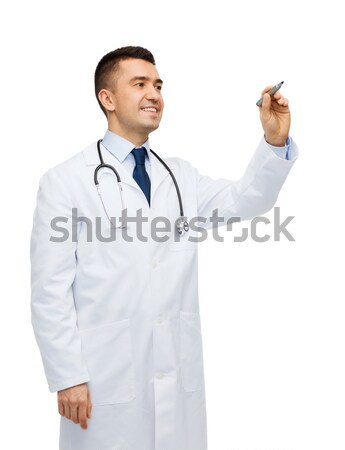 male doctor in white coat pointing finger up Stock photo © dolgachov