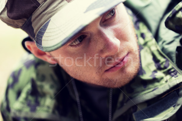 close up of young soldier in military uniform Stock photo © dolgachov