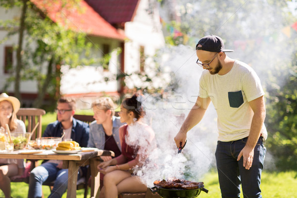 Stock fotó: Férfi · főzés · hús · barbecue · grill · nyár · buli