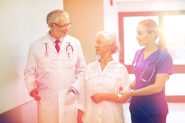 Stock photo: medics and senior patient woman at hospital