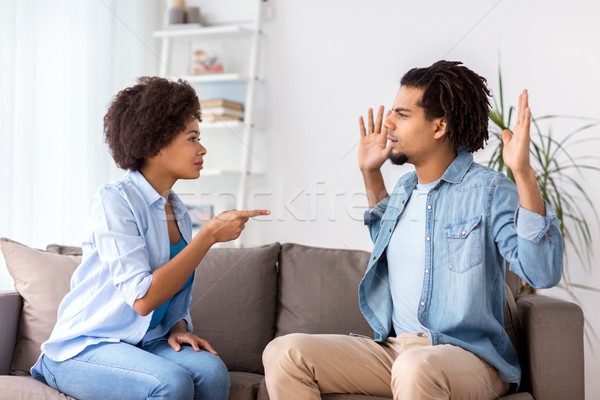 unhappy couple having argument at home Stock photo © dolgachov