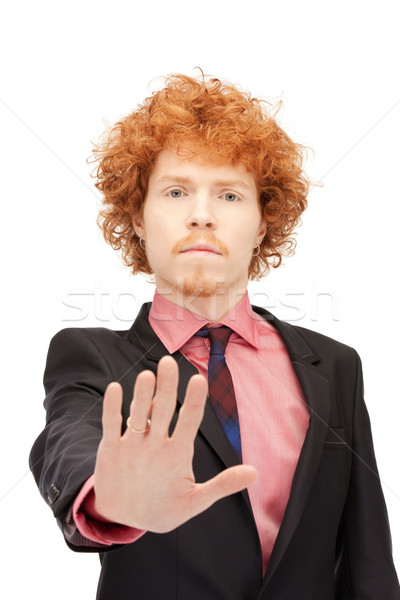 man making stop gesture Stock photo © dolgachov