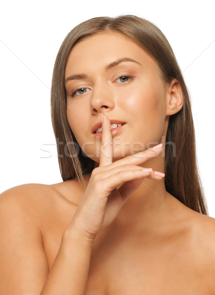 woman with finger on lips Stock photo © dolgachov
