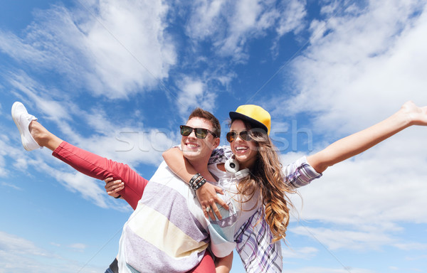 teenagers having fun outside Stock photo © dolgachov