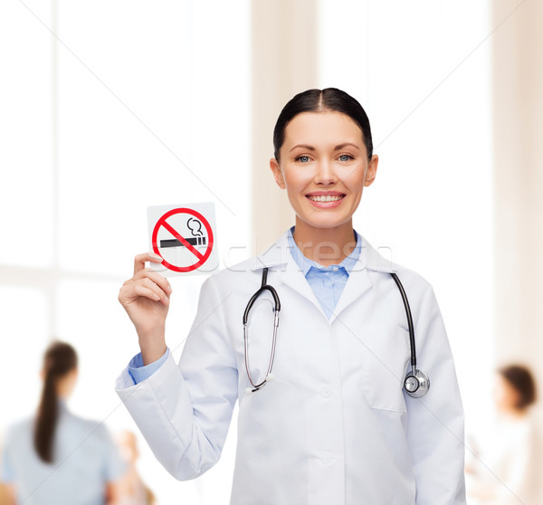 Stock photo: smiling female doctor with stethoscope
