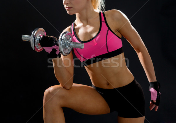 Jonge vrouw zwaar staal Stockfoto © dolgachov