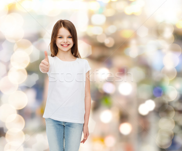 Souriant petite fille blanche tshirt publicité enfance [[stock_photo]] © dolgachov