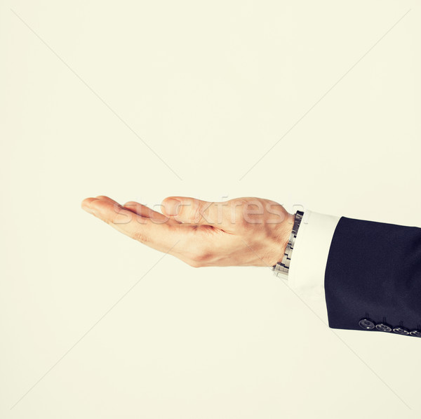 mans hand showing something Stock photo © dolgachov