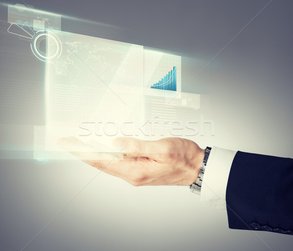 Biznesmen strony wykres faktyczny ekranu Zdjęcia stock © dolgachov