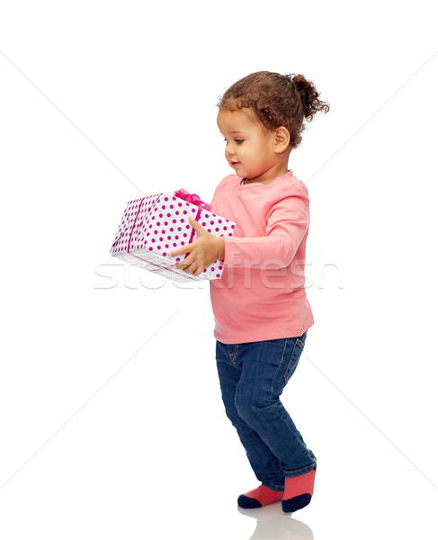 beautiful little baby girl with birthday present Stock photo © dolgachov