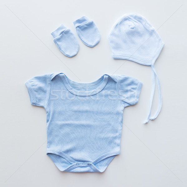 close up of baby boys clothes for newborn on table Stock photo © dolgachov