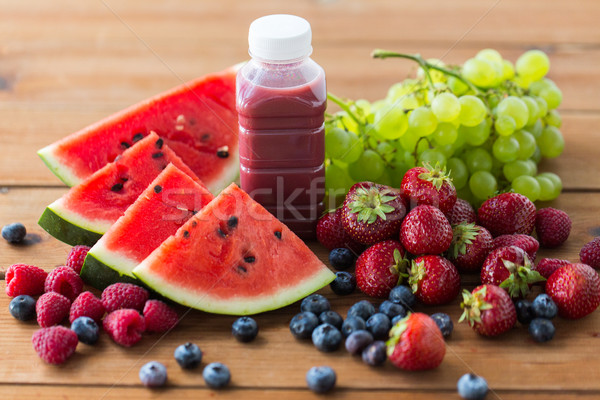 Flasche Obst Beeren Saft Smoothie gesunde Ernährung Stock foto © dolgachov