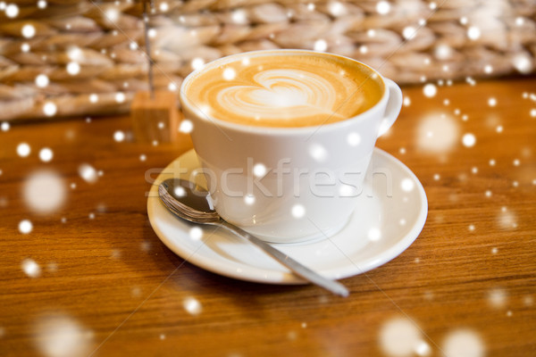 close up of coffee cup with heart shape drawing Stock photo © dolgachov