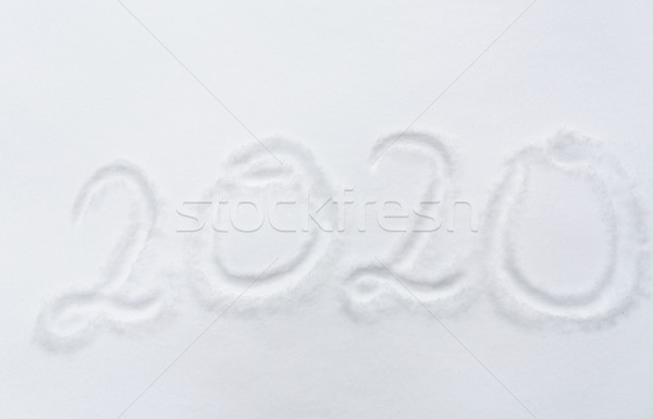 new year 2020 number or date on snow surface Stock photo © dolgachov