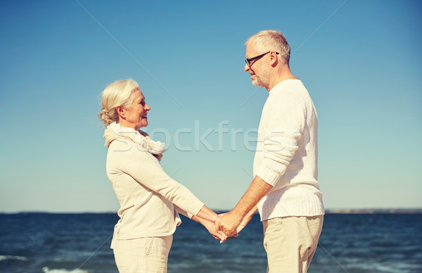 Stockfoto: Gelukkig · holding · handen · zomer · strand · familie