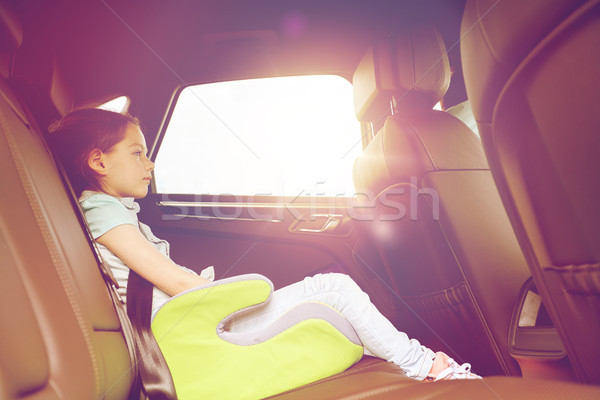 family with child in safety seat driving car Stock photo © dolgachov