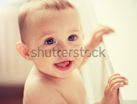happy little baby boy or girl at home Stock photo © dolgachov