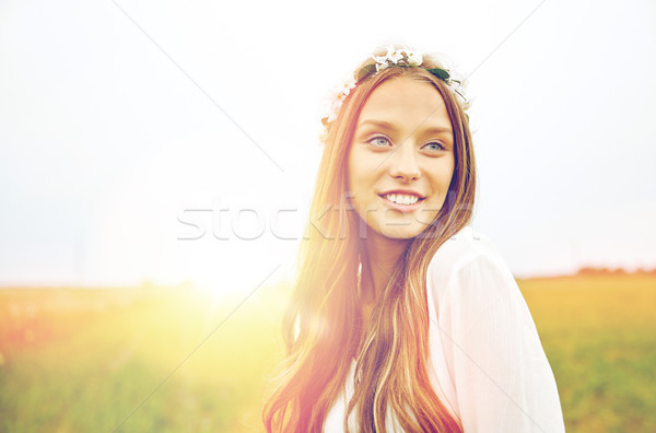 smiling young hippie woman on cereal field Stock photo © dolgachov