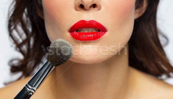 Cara mulher batom vermelho pó beleza Foto stock © dolgachov