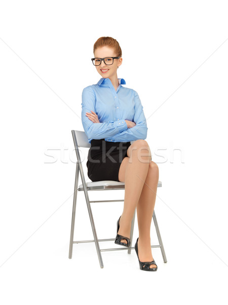 happy and smiling woman on a chair Stock photo © dolgachov