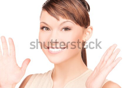Sorprendido rostro de mujer brillante Foto blanco mujer Foto stock © dolgachov