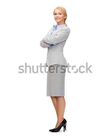 smiling businesswoman with crossed arms Stock photo © dolgachov