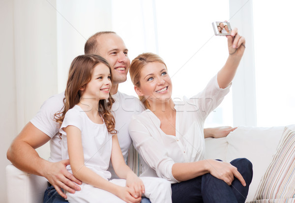 Boldog család kislány készít önarckép család gyermek Stock fotó © dolgachov