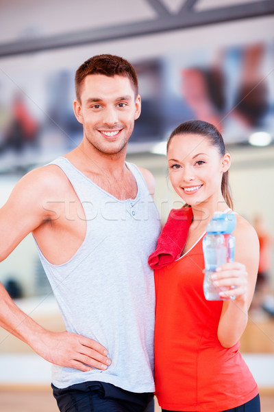 two smiling people in the gym after class Stock photo © dolgachov