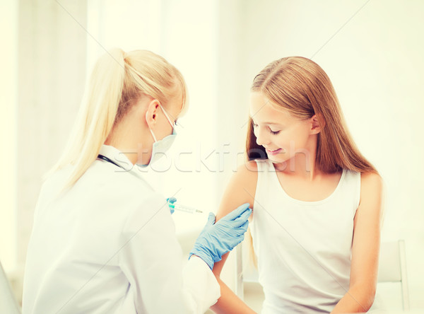 Arzt Impfstoff Kind Krankenhaus Gesundheitswesen medizinischen Stock foto © dolgachov