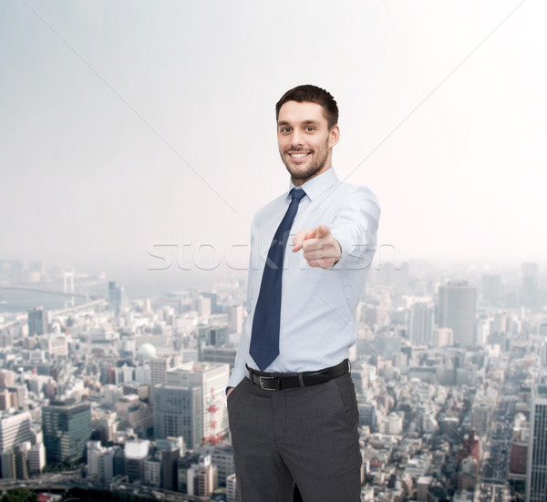 handsome businessman pointing finger at you Stock photo © dolgachov